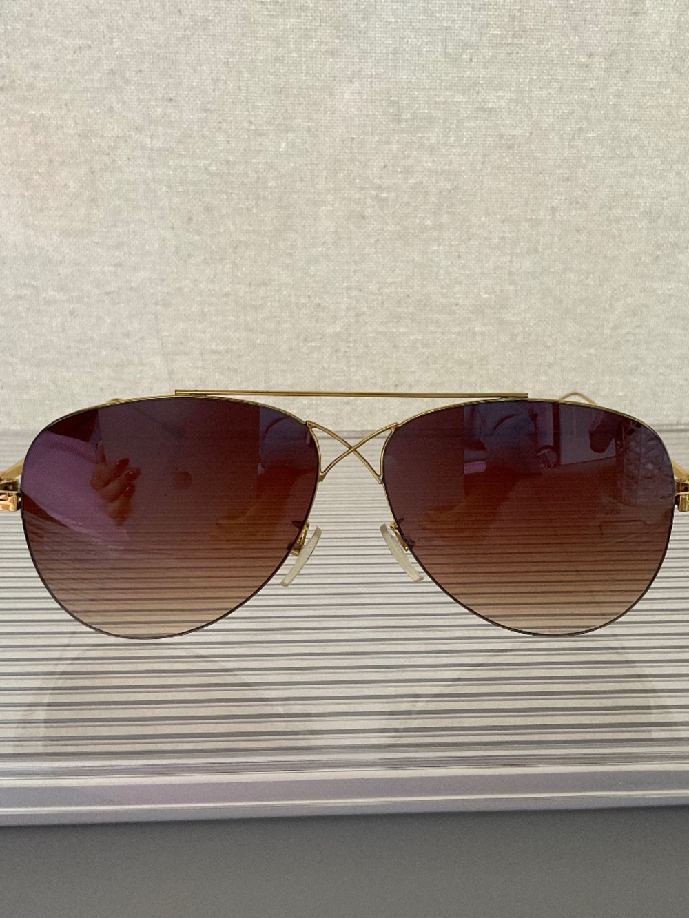 Women's brown and gold sunglasses